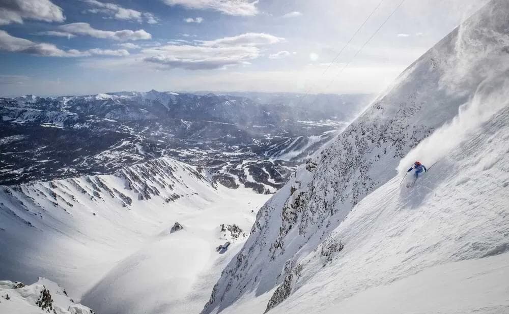 Expert rider takes on the extreme terrain off Lone Peak at Big Sky