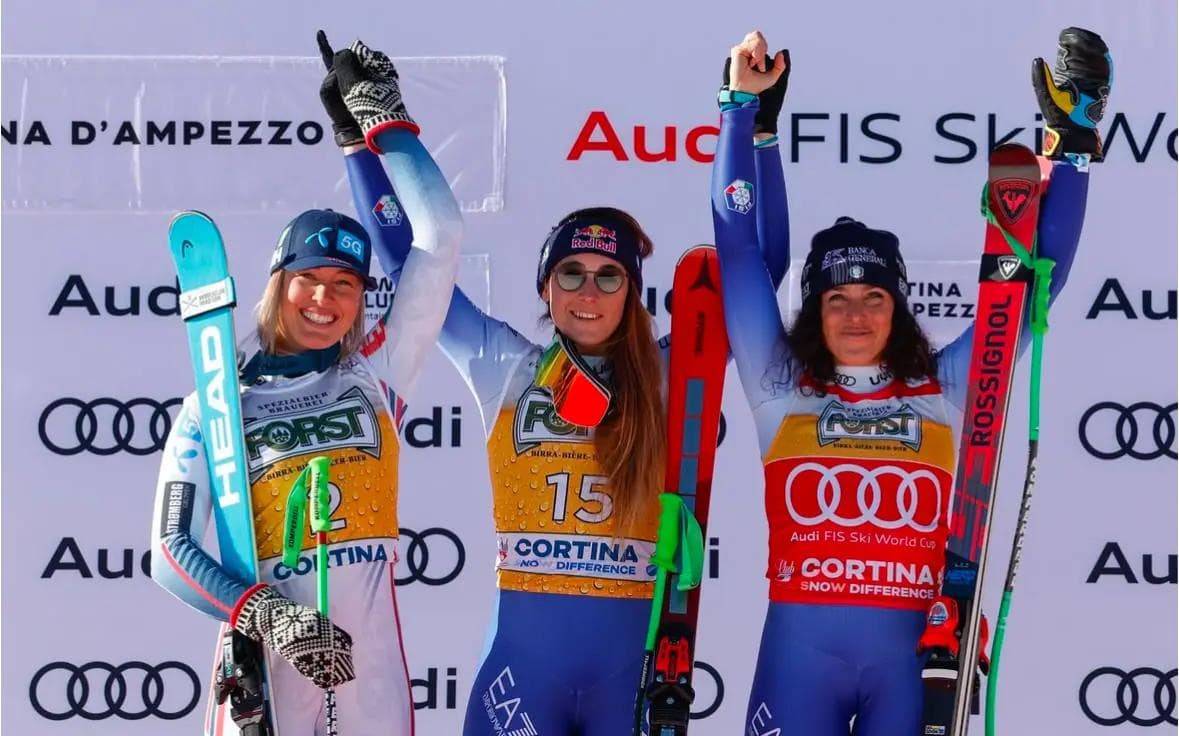The three podium winners of the downhill event.