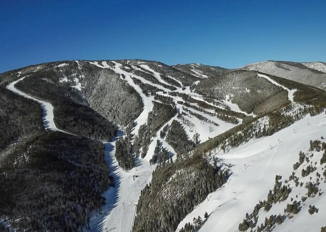 Ski resort base village with lodging, dining, and visitor amenities