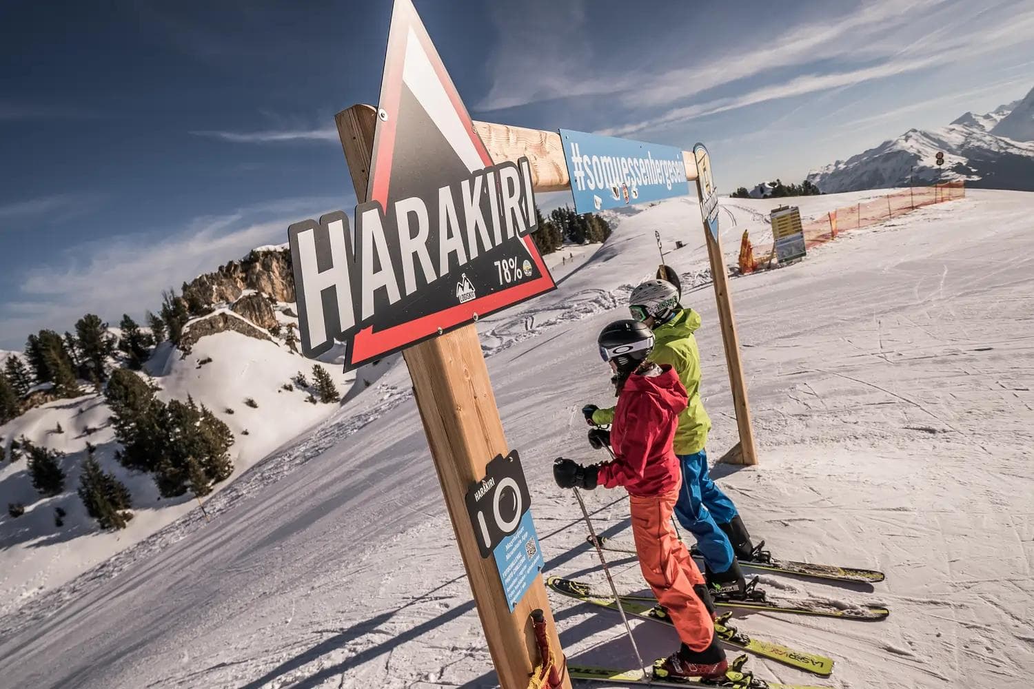 Skiers at the Harakiri Piste