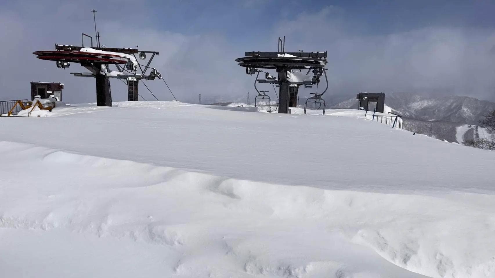 Insane snowfall buries Kagura ski resort.